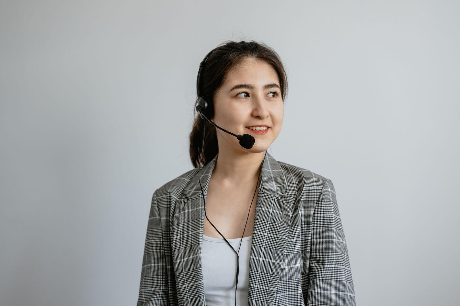 Professional phone interpreter wearing a headset, ready to connect a call